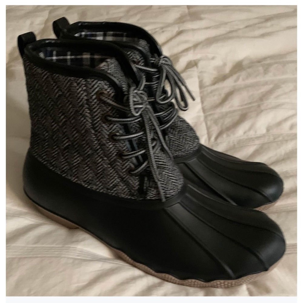 Black duck boots. Never worn.